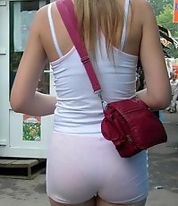 Girls in denim shorts erotically pose