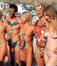 Hot topless babe and nudists in body art